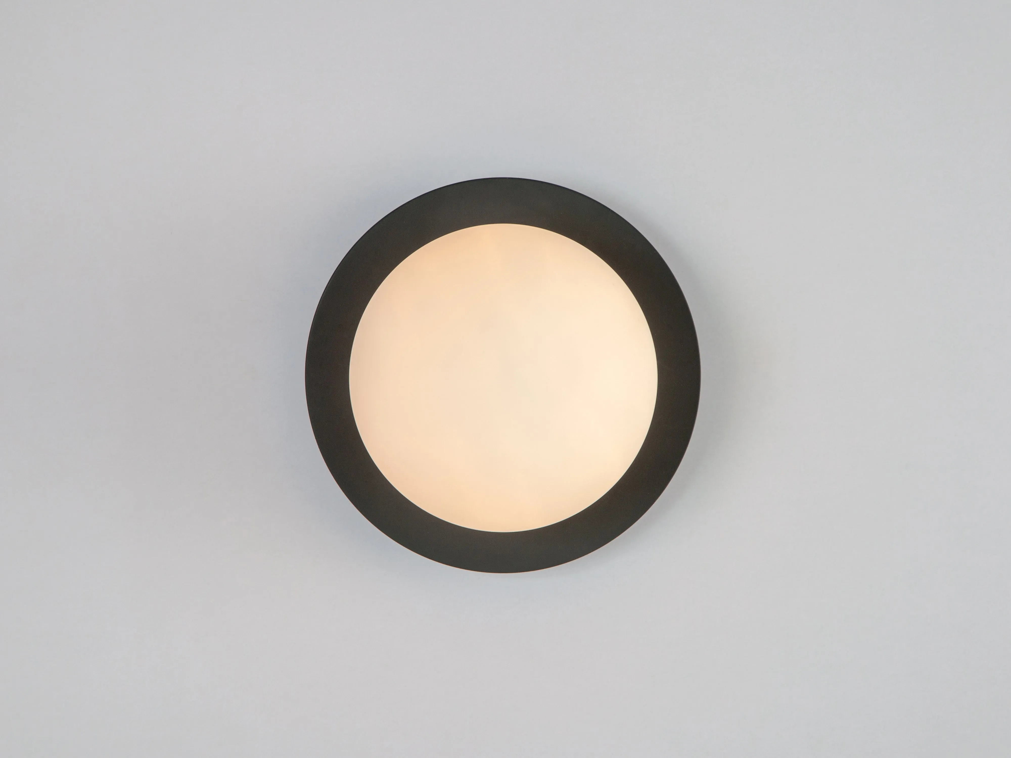 Charcoal grey opal disk wall light